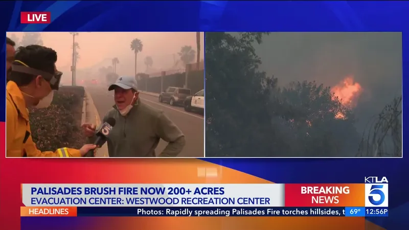 1256 Actor Steve Guttenberg helping fire crews by moving cars near Pacific Palisades brush fire (1).mp4